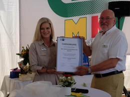 Presentation of certificate of honor Ms Sommer chamber of commerce Limburg